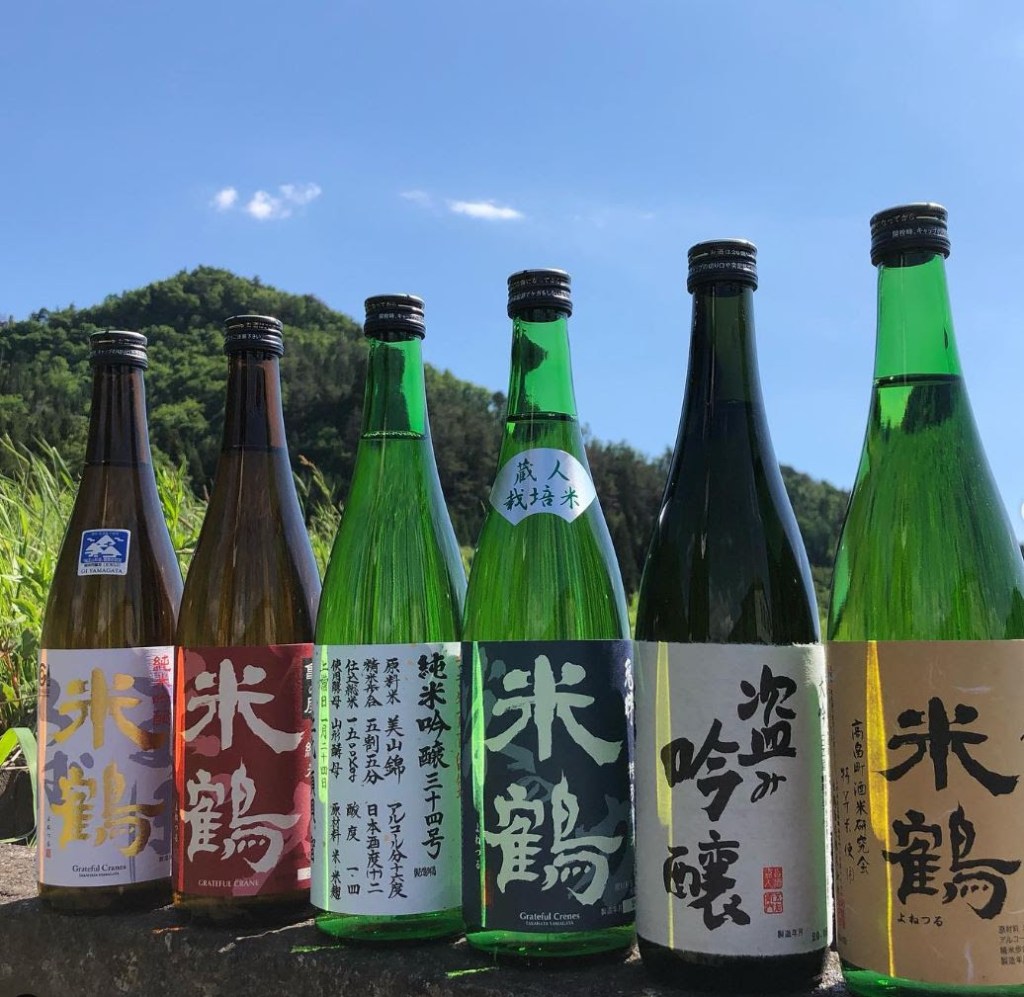 Line up of six Yonetsuru sakes. Photo courtesy of Yonetsuru Brewery.