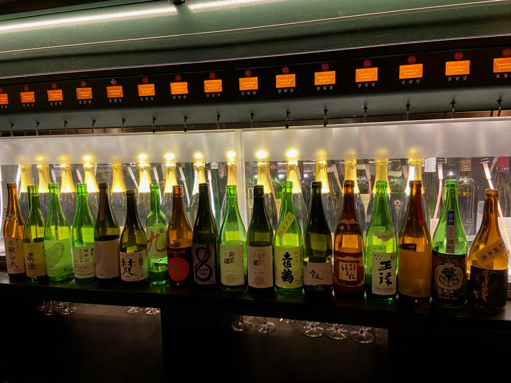 A line up of sake bottles at Vagabond